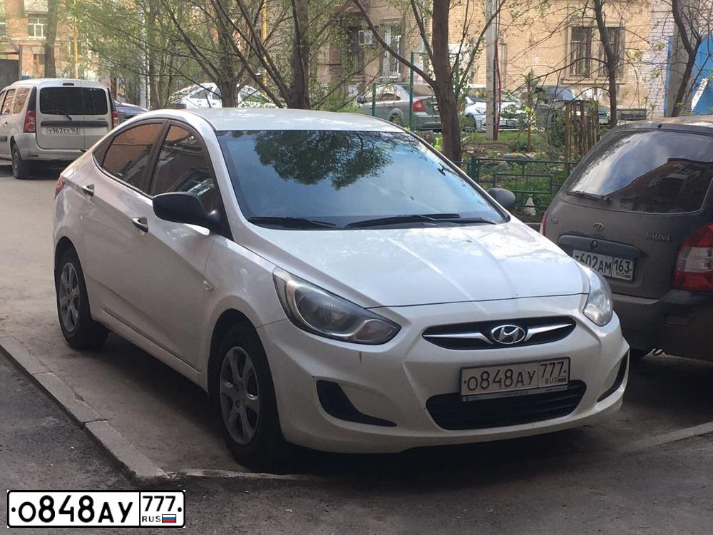 Фото автомобиля HYUNDAI SOLARIS, 2014 — госномер Е712ВМ763. Цвет: Белый