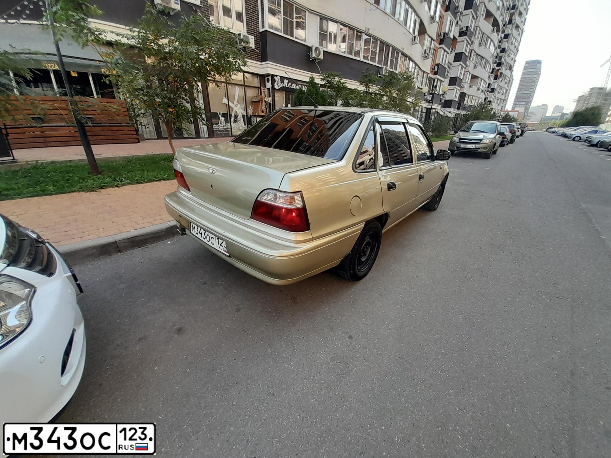 Фото автомобиля DAEWOO NEXIA, 2006 — госномер А012ВК180. Цвет: ПЕСОЧНО-БЕЖЕВЫЙ