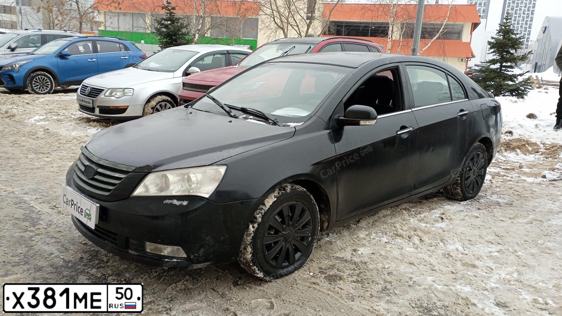 Фото автомобиля GEELY EMGRAND, 2013 — госномер Х381МЕ50. Цвет: ЧЕРНЫЙ