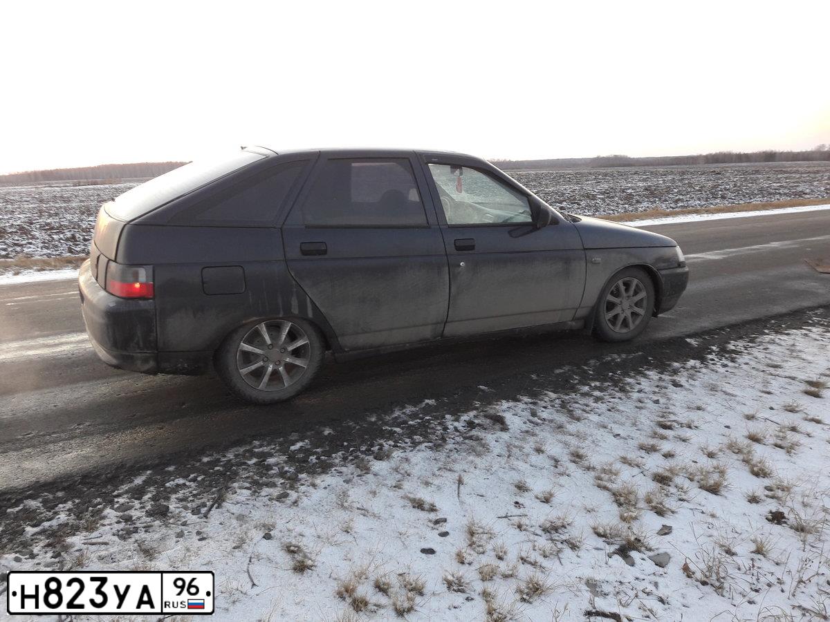 Фото автомобиля LADA 2112 LADA, 2007 — госномер Е716ЕЕ774. Цвет: ЧЕРНЫЙ