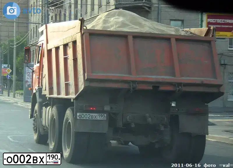 Фото автомобиля KAMAZ 65115 /6X4/, 2005 — госномер Т031ОХ58. Цвет: ОРАНЖЕВЫЙ