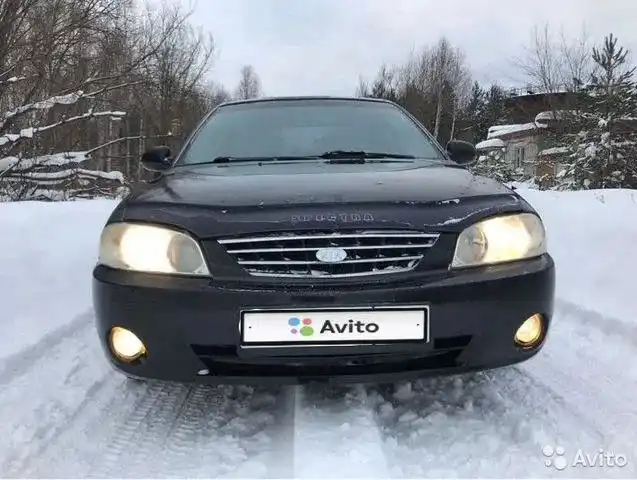 Фото автомобиля KIA SPECTRA, 2008 — госномер М991СО21. Цвет: Темно-синий