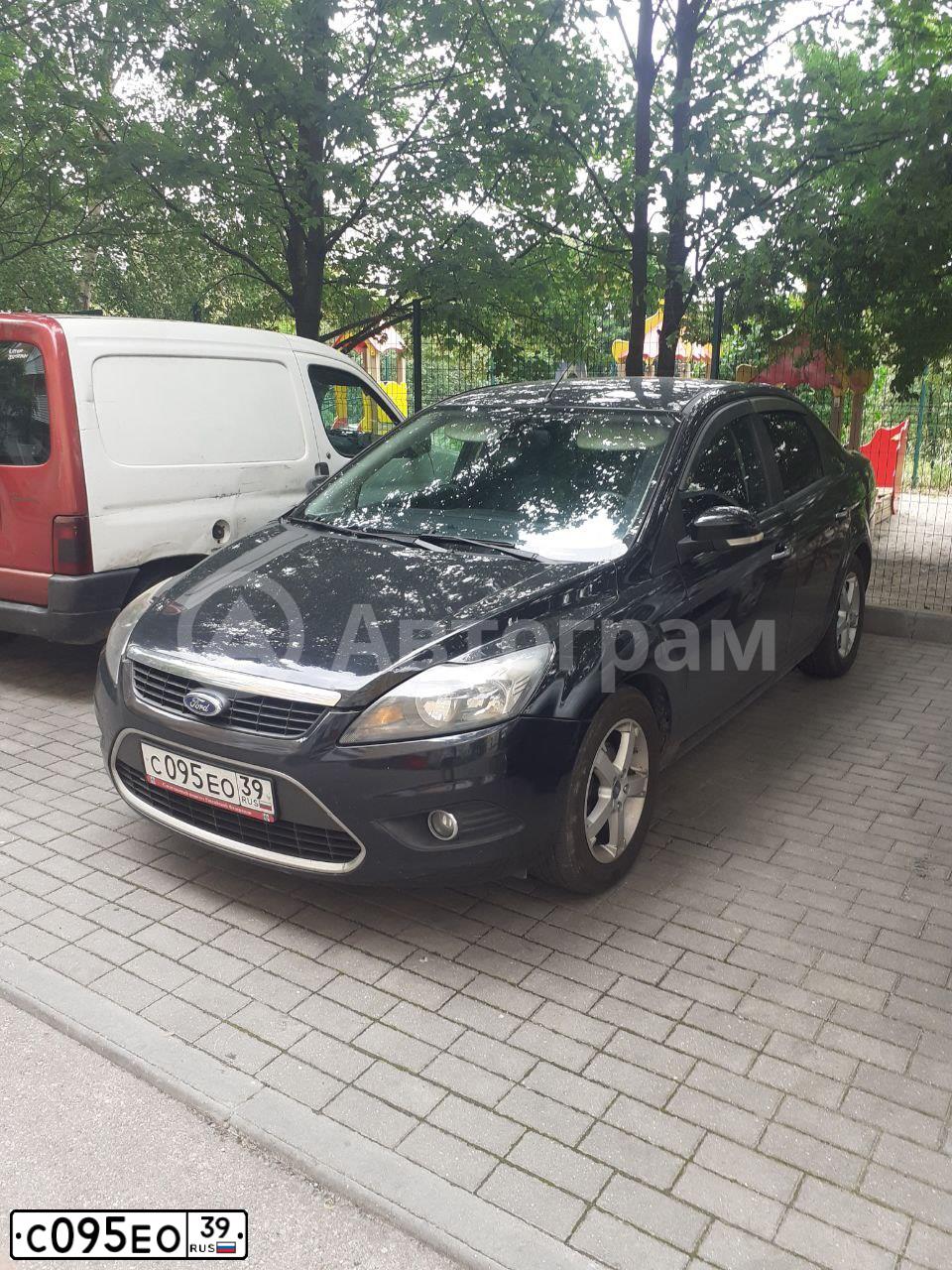 Фото автомобиля FORD FOCUS, 2009 — госномер С095ЕО39. Цвет: ЧЕРНЫЙ