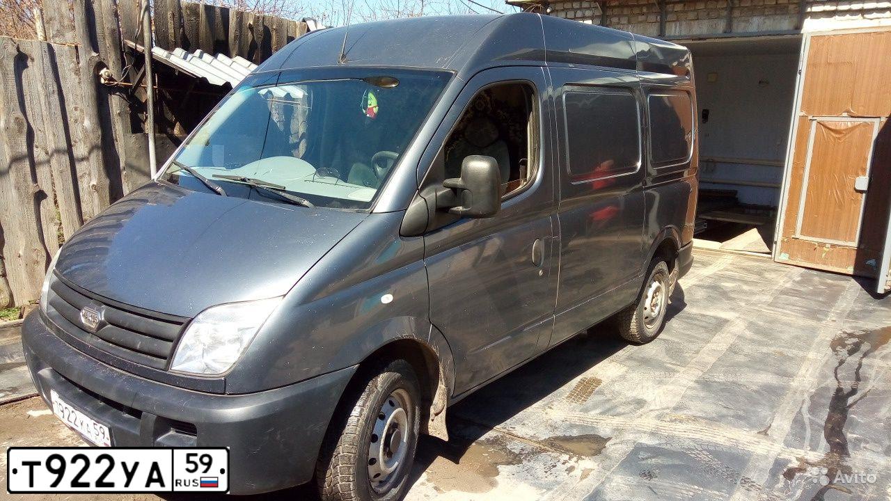 Фото автомобиля RENAULT LOGAN, 2010 — госномер Н615ОВ159. Цвет: ЧЕРНЫЙ