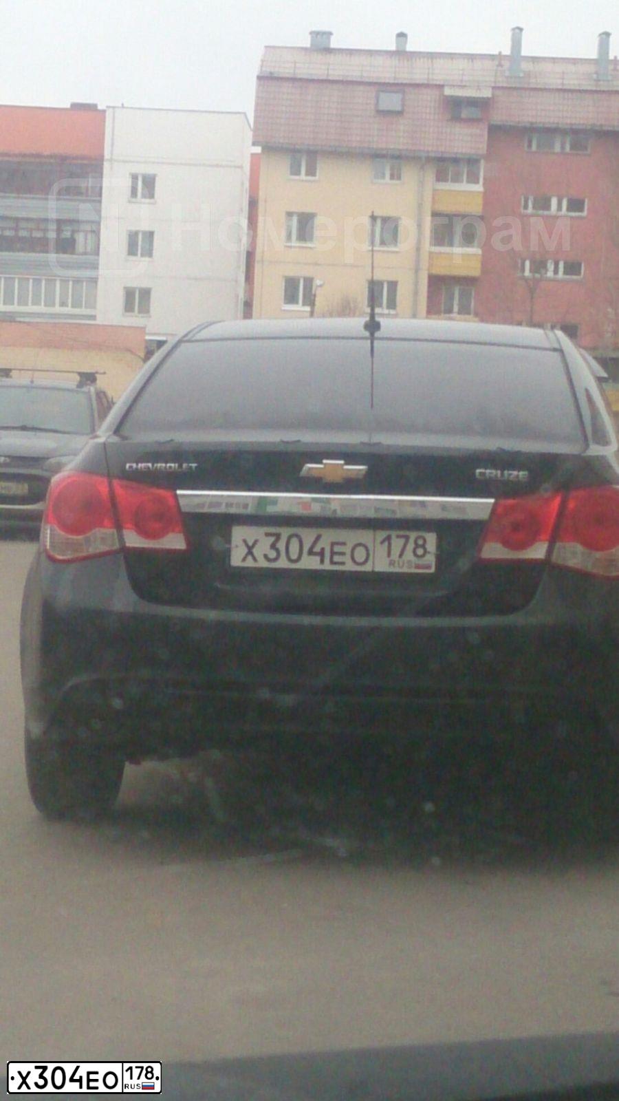 Фото автомобиля CHEVROLET CRUZE, 2012 — госномер Е590ОН53. Цвет: ЧЕРНЫЙ МЕТАЛЛИК