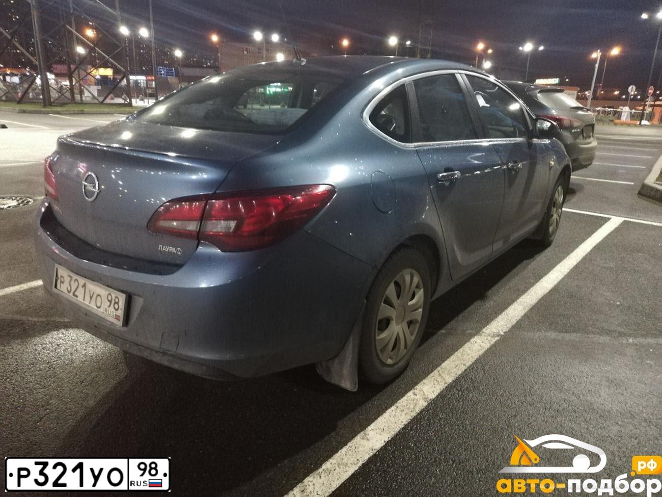 Фото автомобиля OPEL ASTRA, 2012 — госномер Н990ВТ136. Цвет: СИНИЙ МЕТАЛЛИК