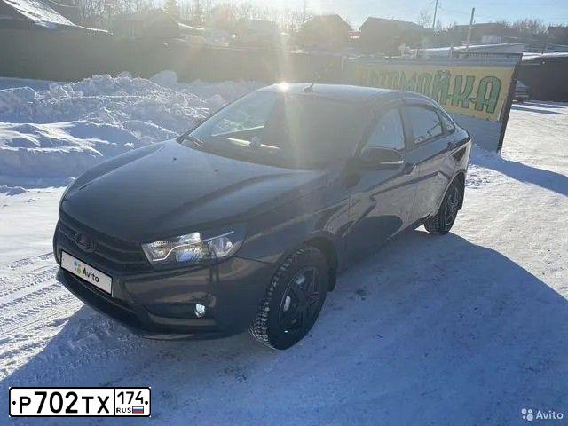 Фото автомобиля LADA VESTA, 2017 — госномер А769НА702. Цвет: Коричневый