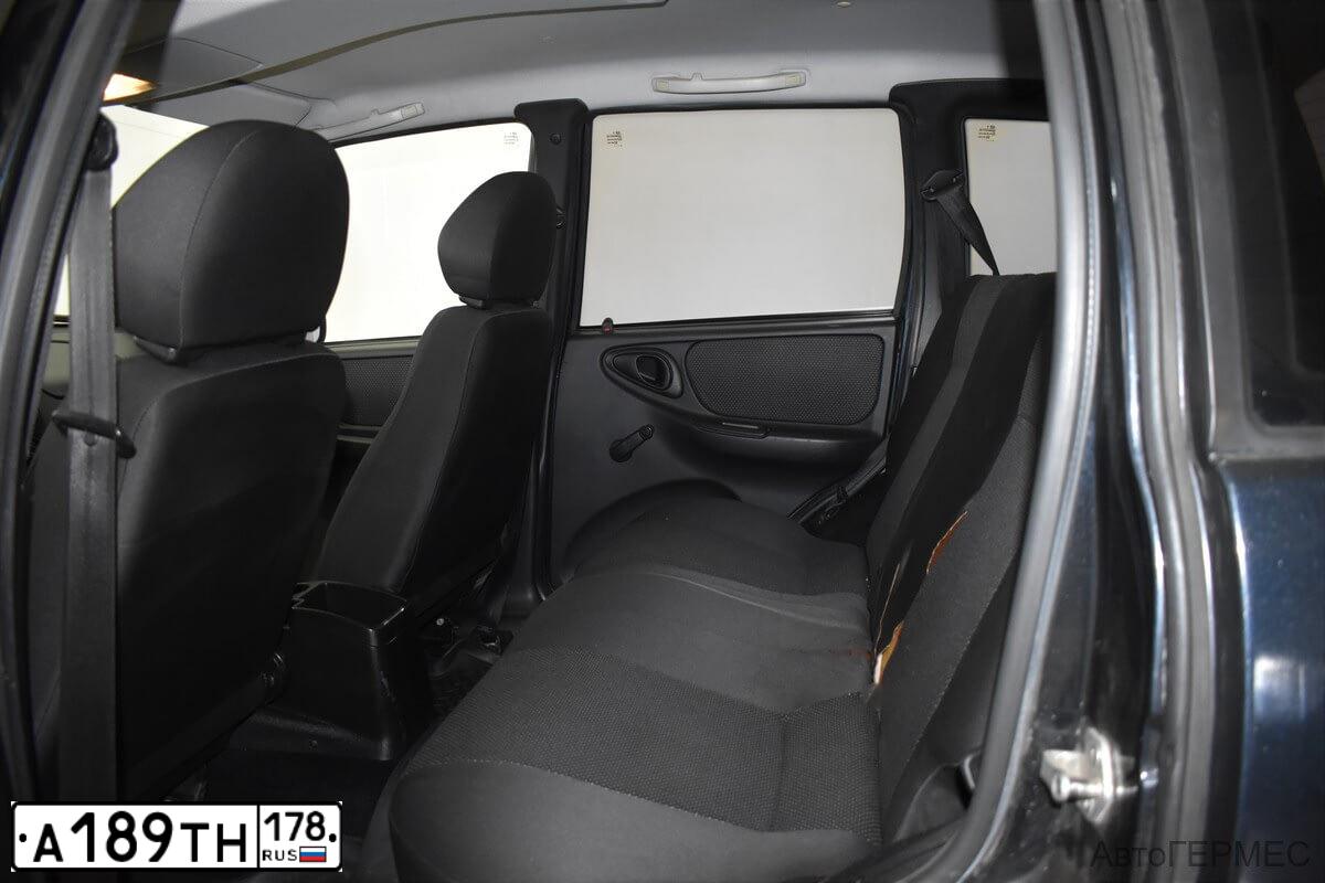 Фото автомобиля CHEVROLET NIVA, 2010 — госномер М764ВМ180. Цвет: ЧЕРН0-СИНИЙ МЕТАЛЛИК