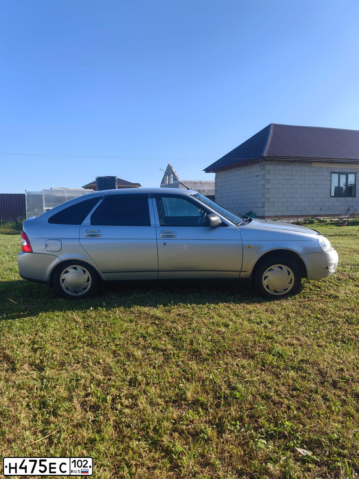 Фото автомобиля LADA 2172 PRIORA, 2012 — госномер Н475ЕС102. Цвет: СВЕТЛО-СЕРЕБРИСТЫЙ МЕТАЛЛ