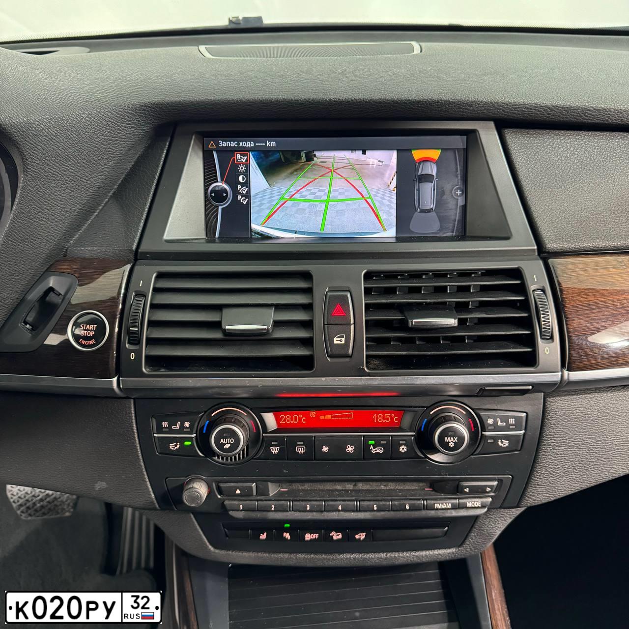 Фото автомобиля BMW X5, 2009 — госномер Е245ХА185. Цвет: Белый