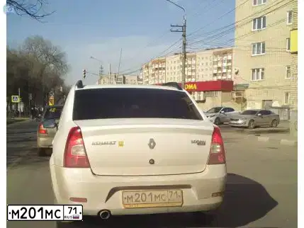 Фото автомобиля RENAULT LOGAN, 2012 — госномер М201МС71. Цвет: Белый