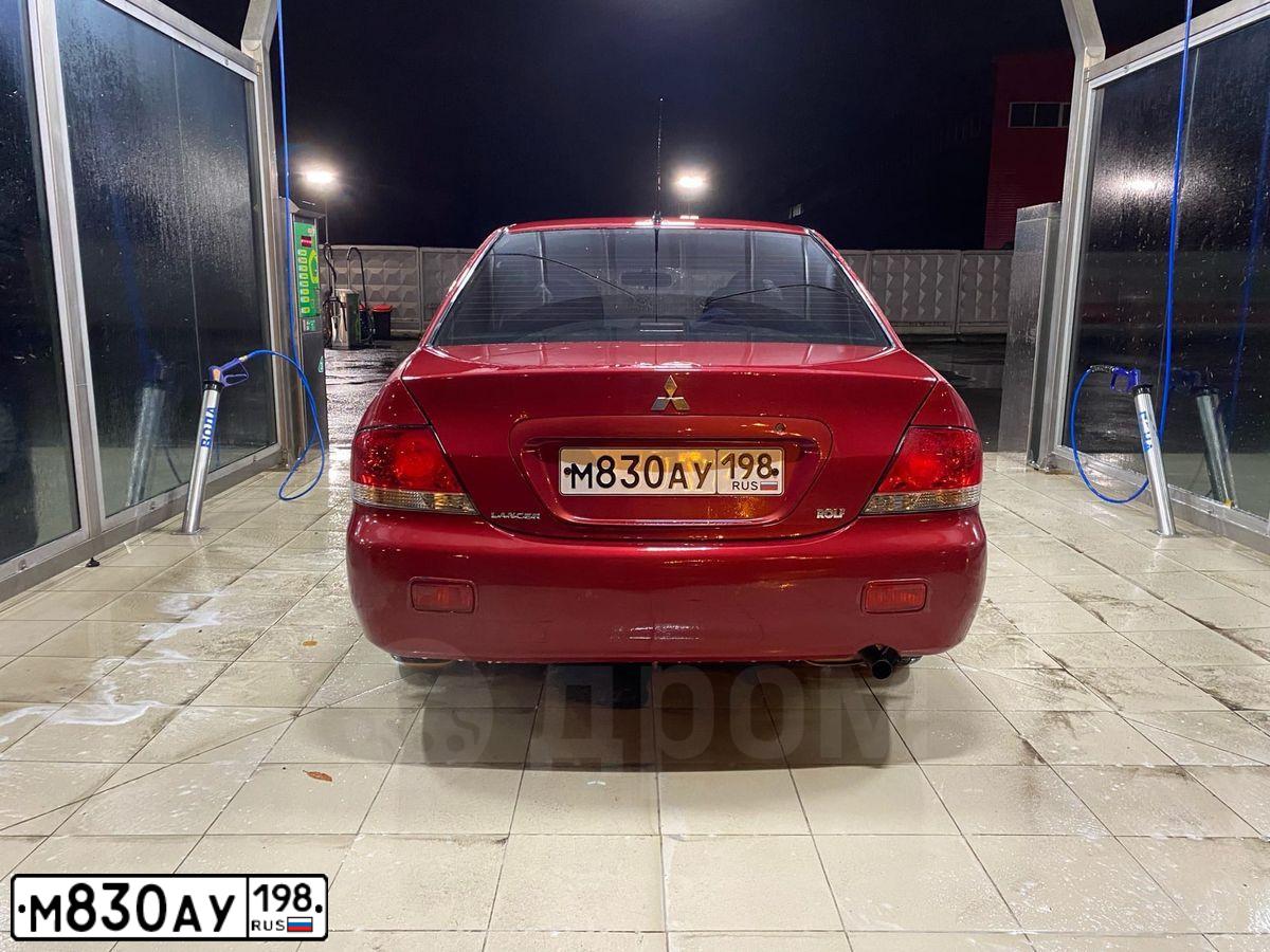 Фото автомобиля MITSUBISHI LANCER, 2004 — госномер Н415СМ797. Цвет: Красный