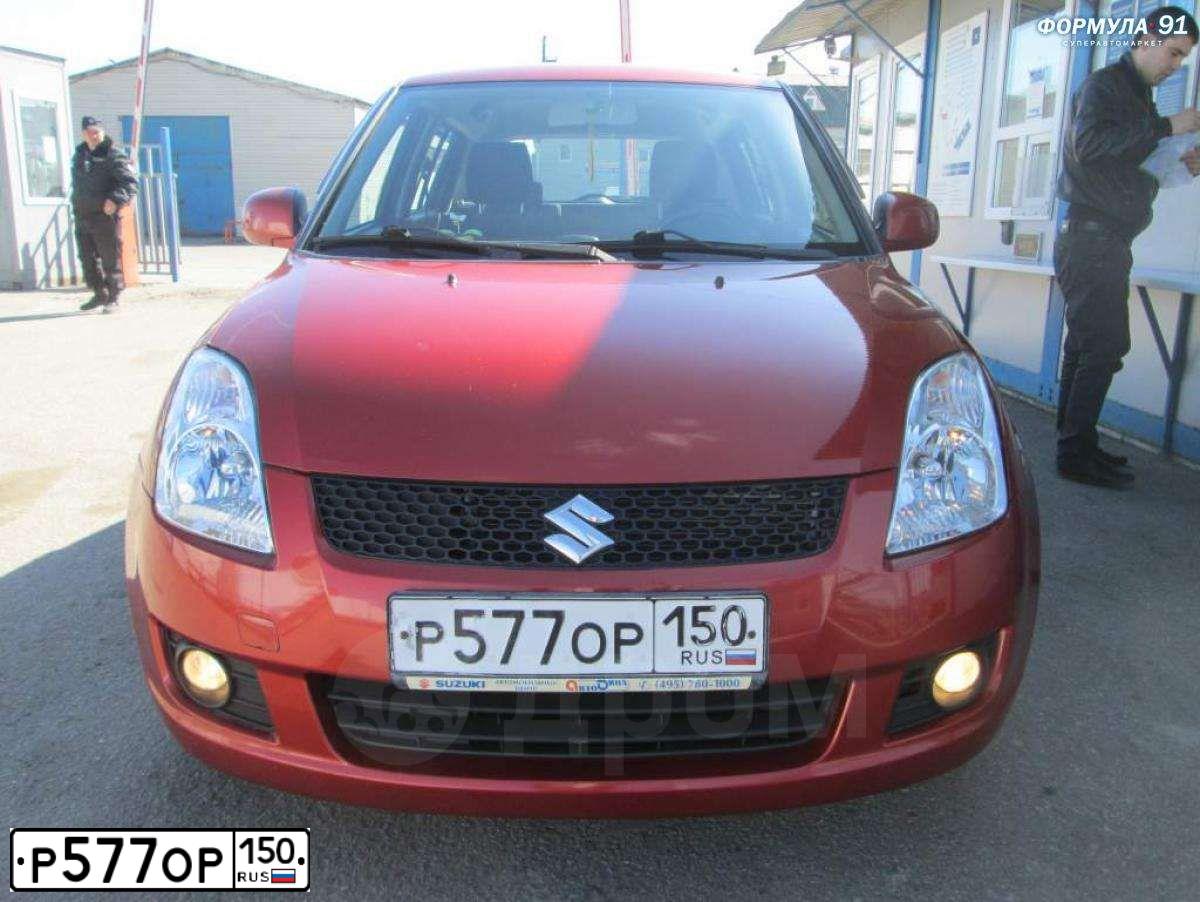 Фото автомобиля SUZUKI SWIFT, 2007 — госномер Р577ОР150. Цвет: ОРАНЖЕВЫЙ