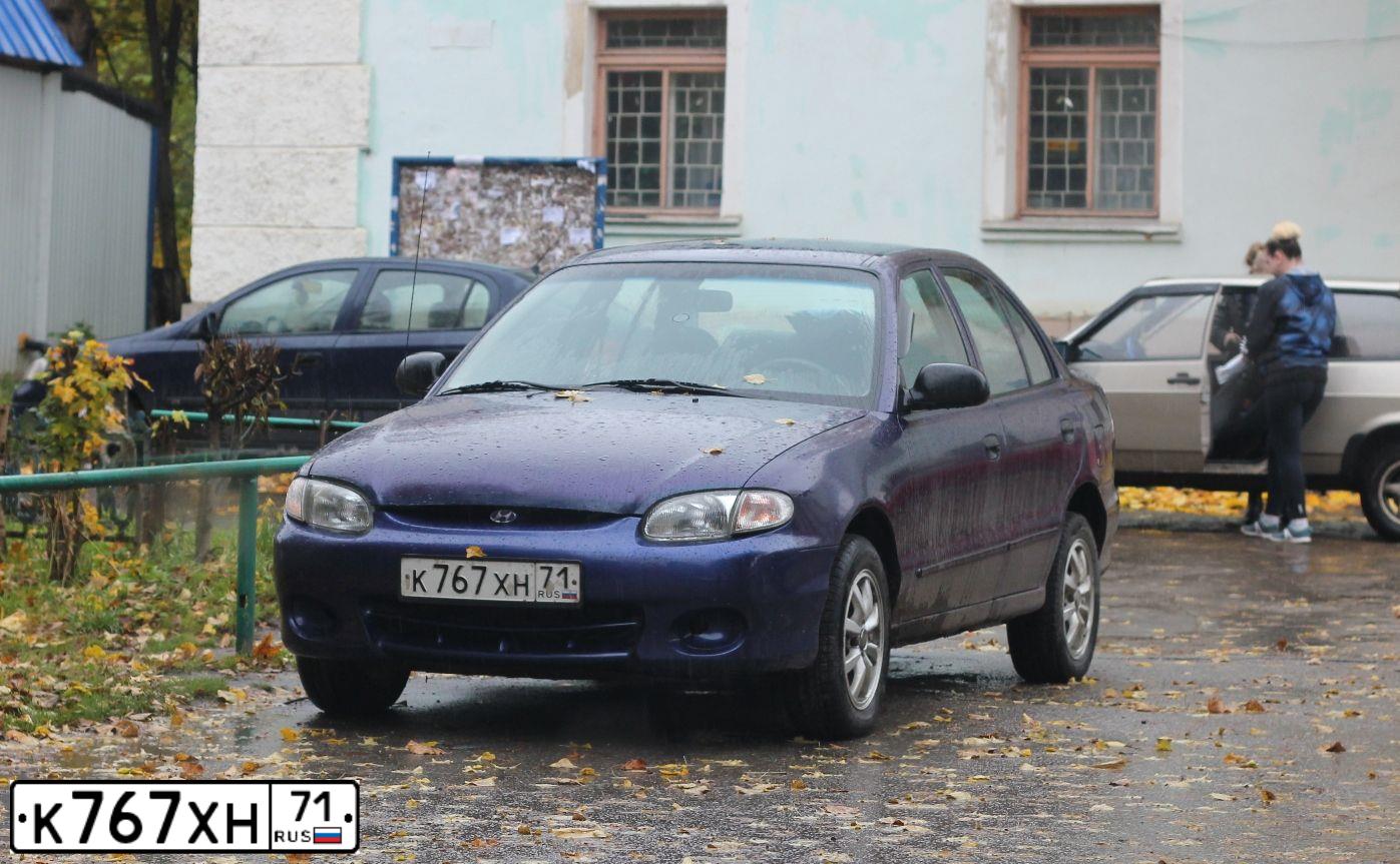 Фото автомобиля HYUNDAI ACCENT, 1999 — госномер Х196АК71. Цвет: ФИОЛЕТОВЫЙ