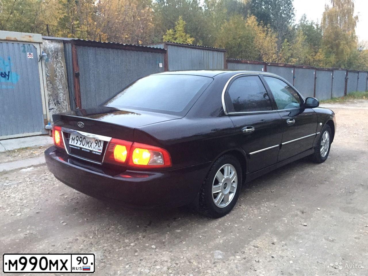 Фото автомобиля KIA MAGENTIS / OPTIMA, 2003 — госномер М990МХ90. Цвет: ЧЕРНЫЙ