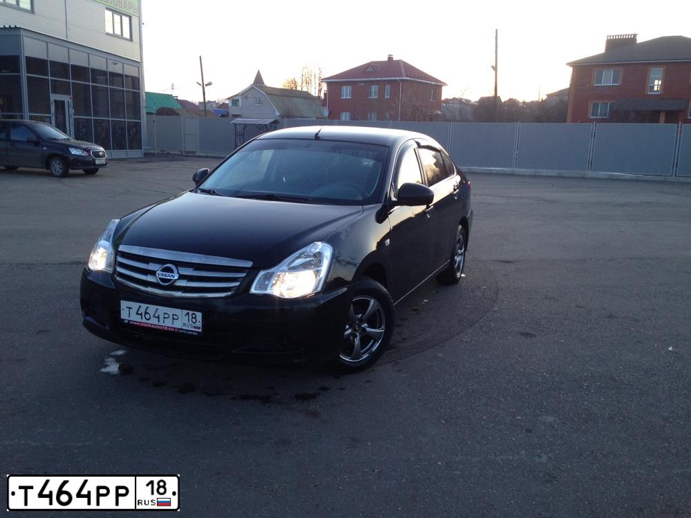 Фото автомобиля NISSAN ALMERA /AVTOVAZ/, 2014 — госномер К895ХВ702. Цвет: ЧЕРНЫЙ