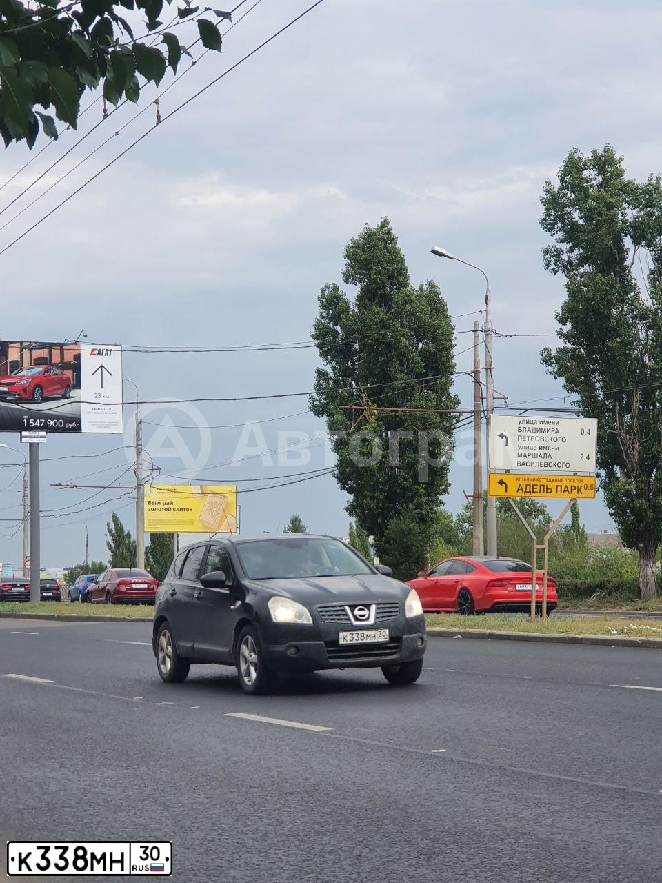 Фото автомобиля NISSAN QASHQAI, 2008 — госномер К338МН30. Цвет: ЧЕРНЫЙ