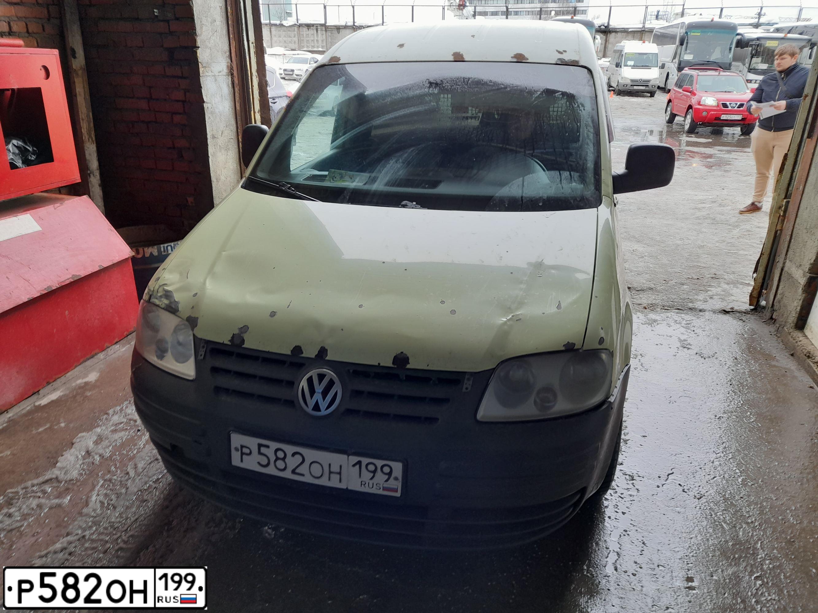 Фото автомобиля VOLKSWAGEN CADDY, 2004 — госномер Н645ЕВ977. Цвет: САЛАТОВЫЙ