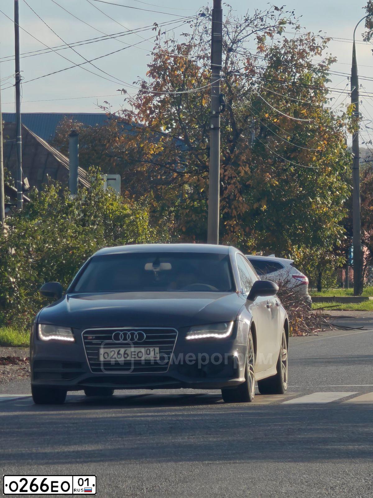 Фото автомобиля AUDI A7, 2012 — госномер О266ЕО01. Цвет: ФИОЛЕТОВЫЙ