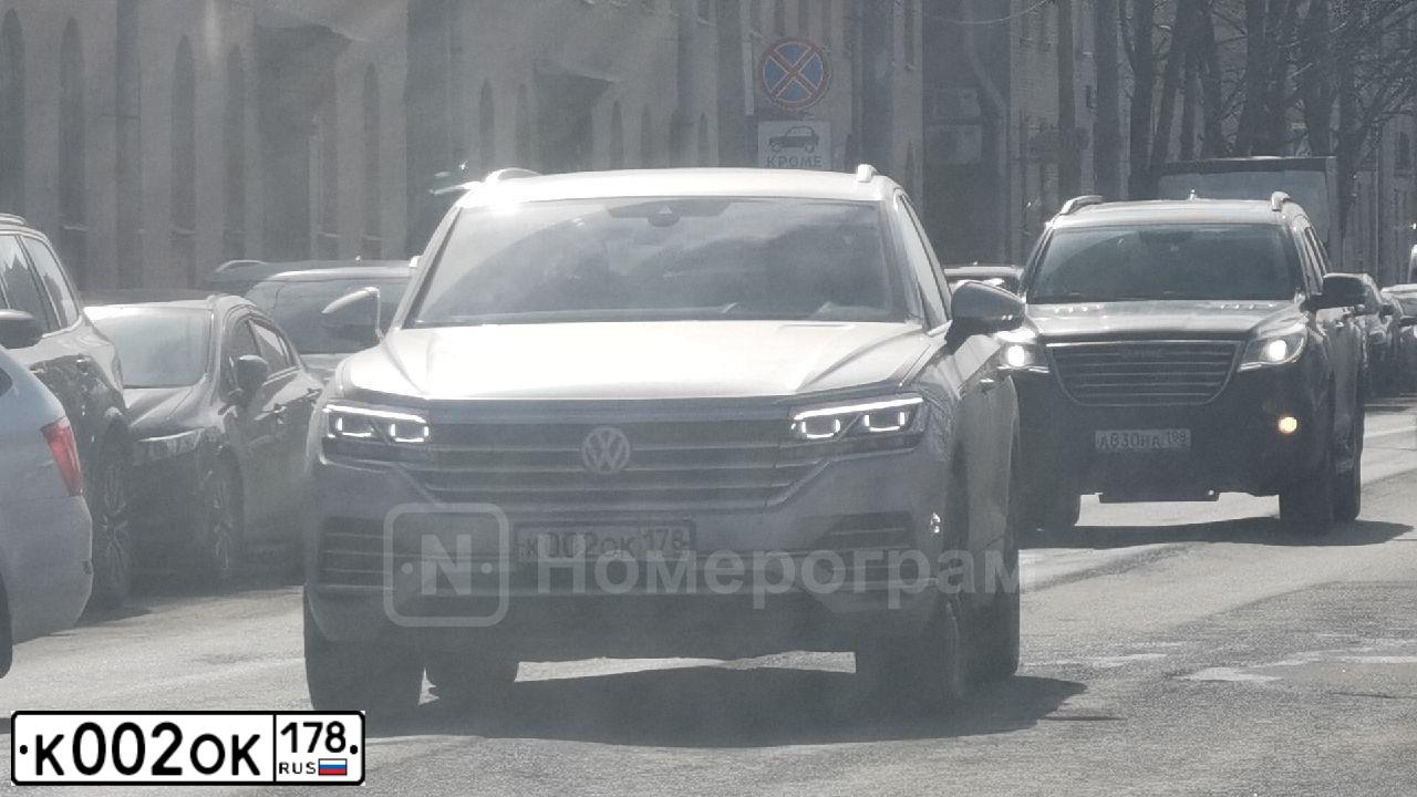 Фото автомобиля NISSAN X-TRAIL, 2012 — госномер К002ОК178. Цвет: СЕРЫЙ