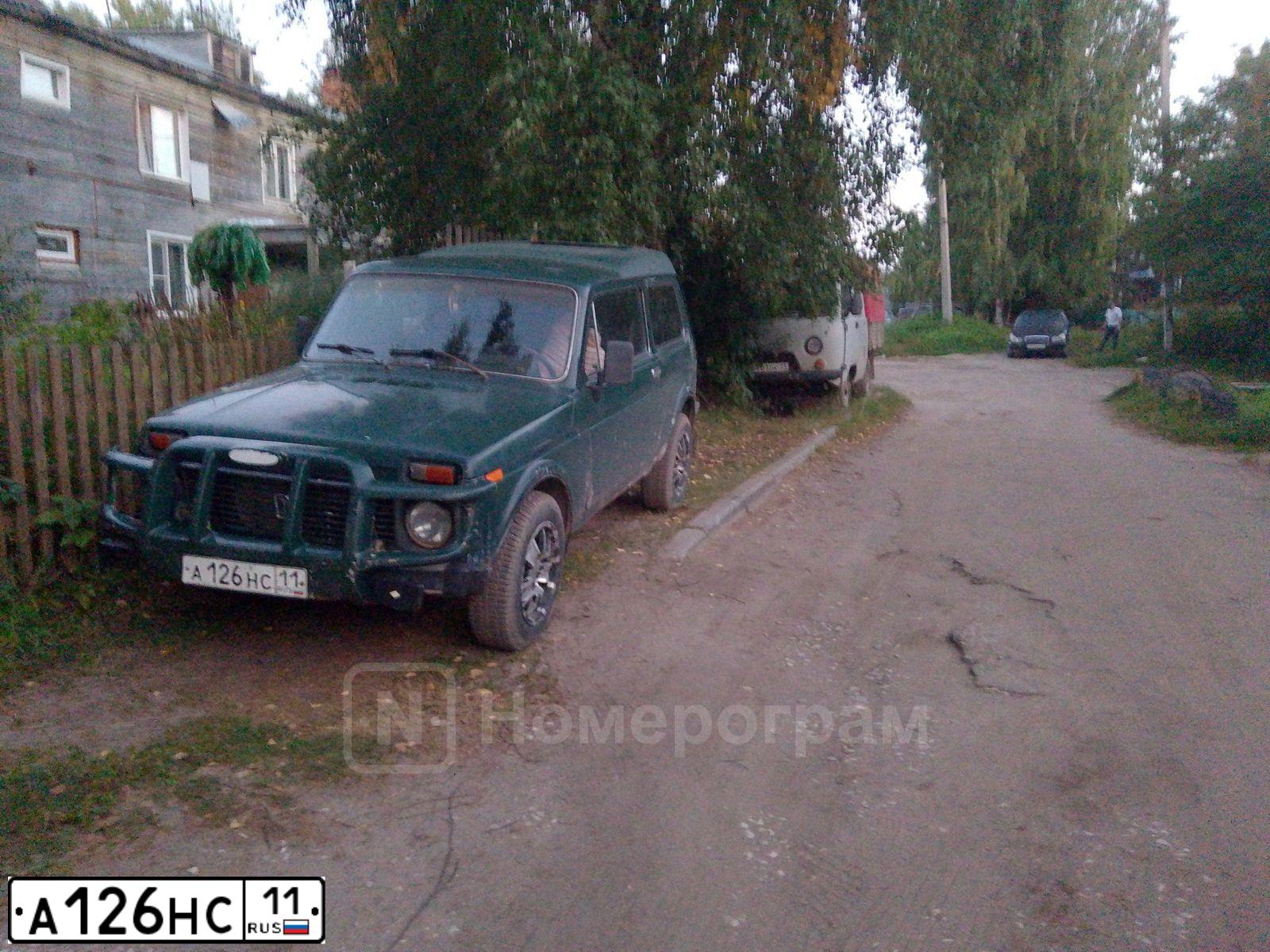 Фото автомобиля LADA 2121 NIVA, 1998 — госномер А126НС11. Цвет: ЗЕЛЕНЫЙ САД