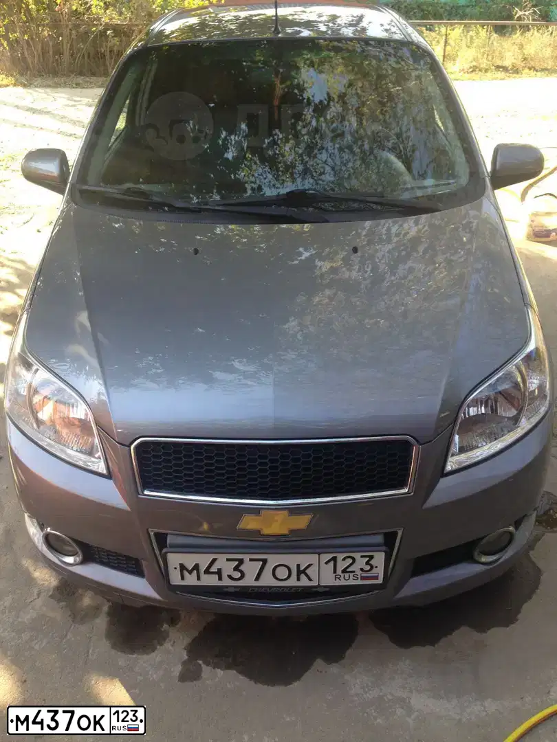 Фото автомобиля CHEVROLET AVEO, 2010 — госномер А205УТ193. Цвет: СЕРЫЙ