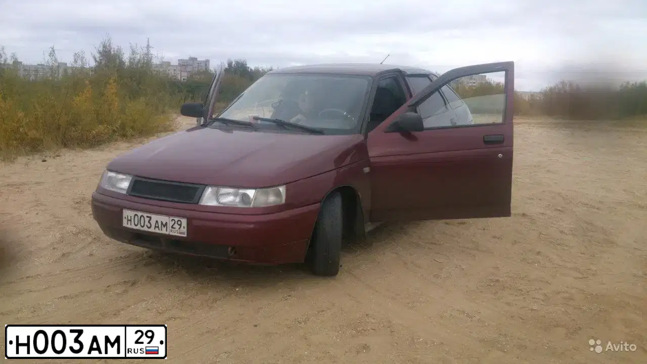 Фото автомобиля LADA 2112 LADA, 2004 — госномер Н003АМ29. Цвет: ТЕМНО-МАЛИНОВЫЙ