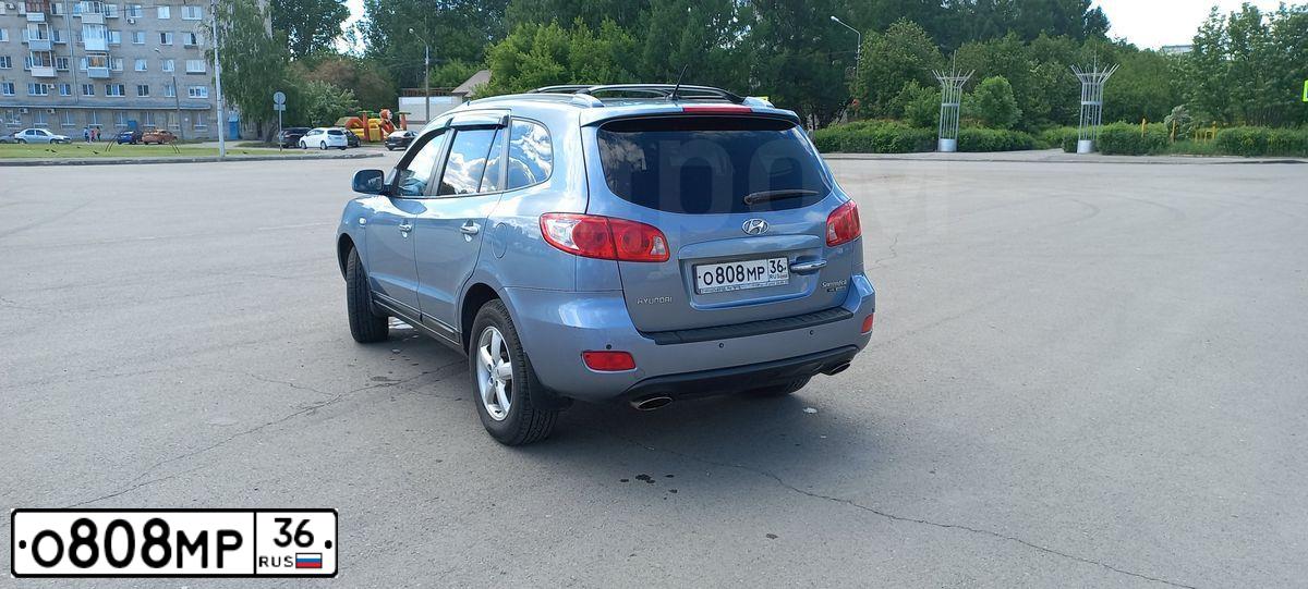 Фото автомобиля HYUNDAI SANTA FE, 2007 — госномер М555МН36. Цвет: СЕРО-ГОЛУБОЙ