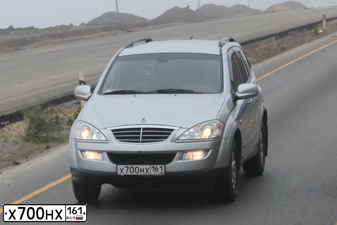 Фото автомобиля SSANGYONG KYRON, 2011 — госномер К873РР161. Цвет: СЕРЕБРИСТЫЙ