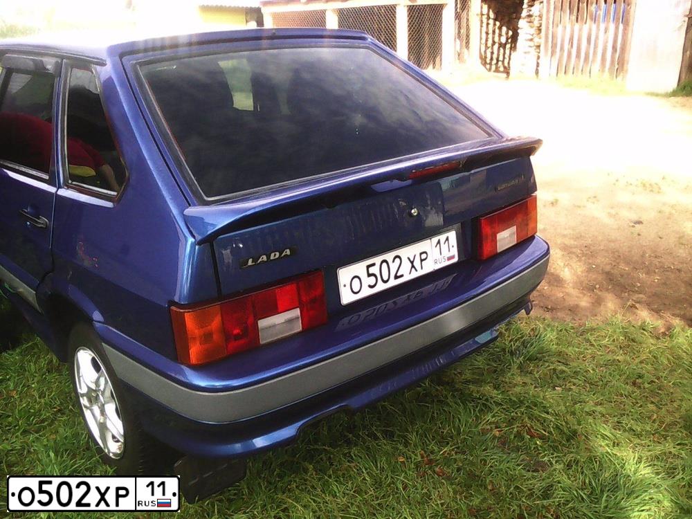 Фото автомобиля LADA 2114 SAMARA, 2005 — госномер Н055НТ11. Цвет: Серебристо-темно-синий