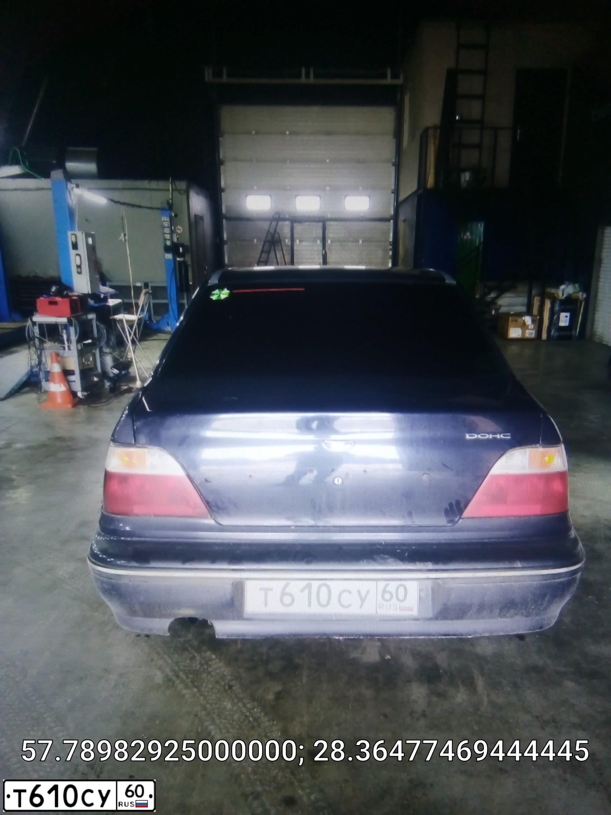 Фото автомобиля DAEWOO NEXIA, 2004 — госномер Т610СУ60. Цвет: Темно-синий