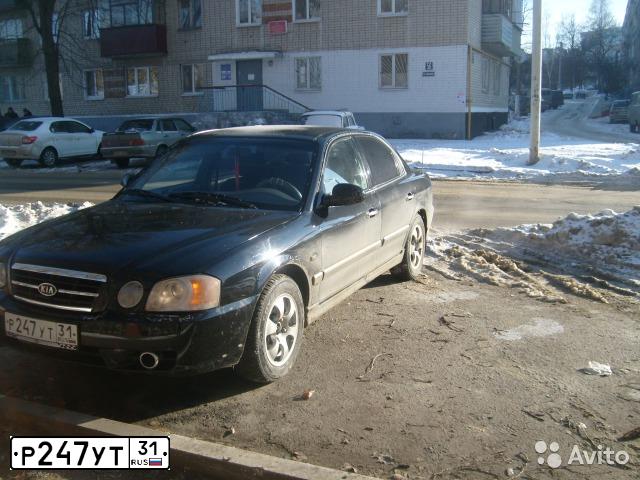 Фото автомобиля KIA MAGENTIS / OPTIMA, 2003 — госномер О876НР31. Цвет: ЧЕРНЫЙ