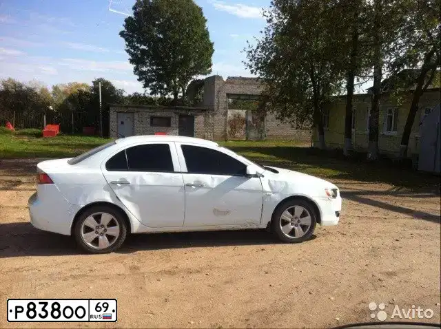 Фото автомобиля MITSUBISHI LANCER, 2008 — госномер Р838ОО69. Цвет: БЕЛЫЙ