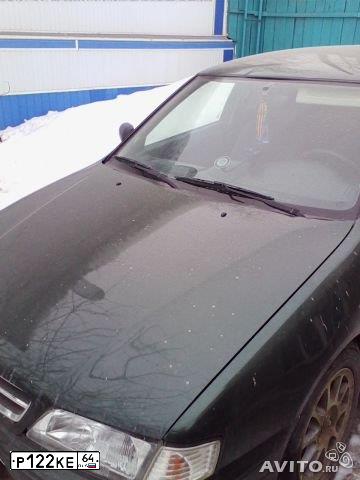 Фото автомобиля DAEWOO ESPERO, 1997 — госномер Р122КЕ64. Цвет: СЕРЫЙ