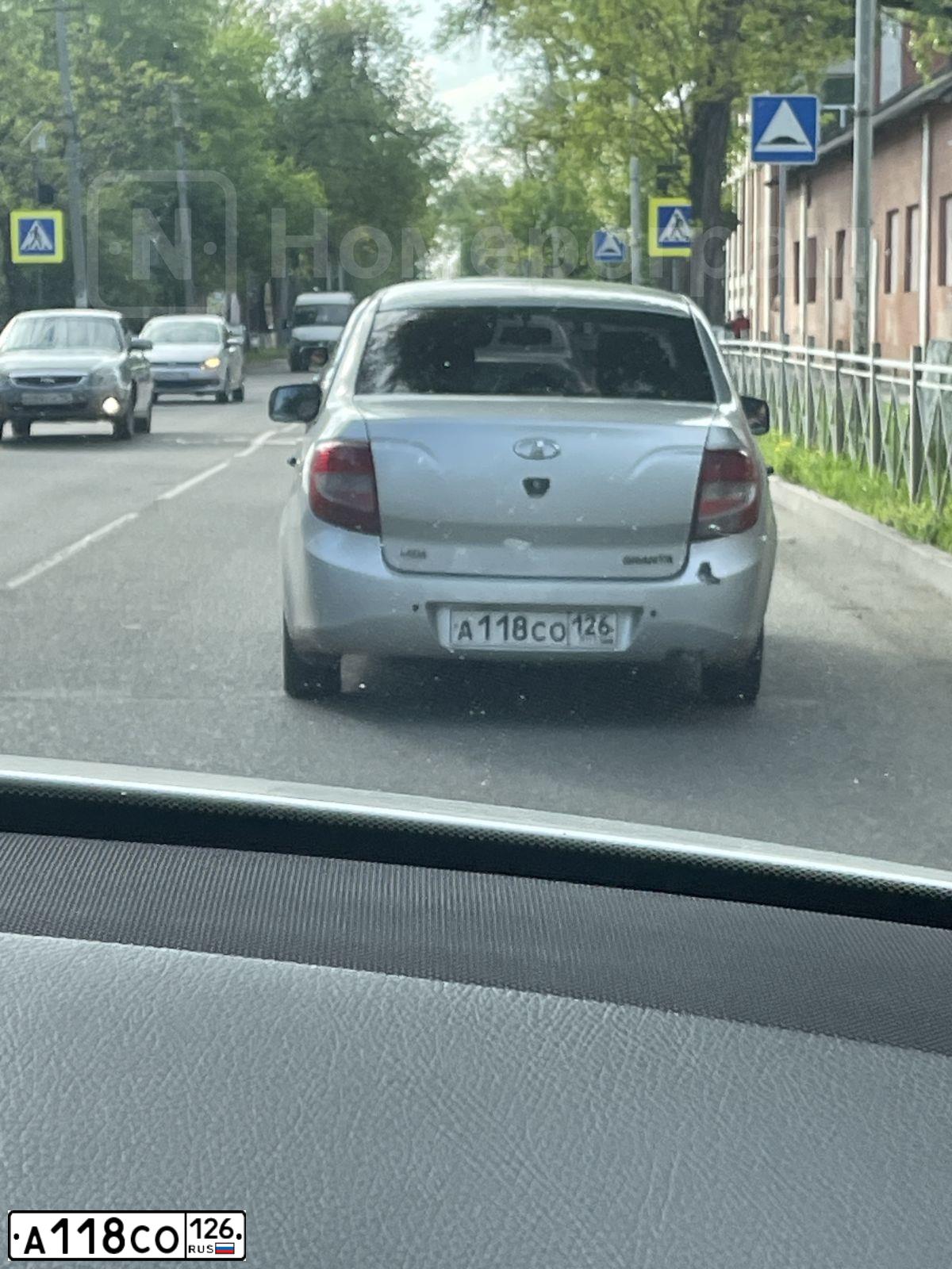 Фото автомобиля LADA 2190 GRANTA, 2012 — госномер Н143ЕХ126. Цвет: Красный