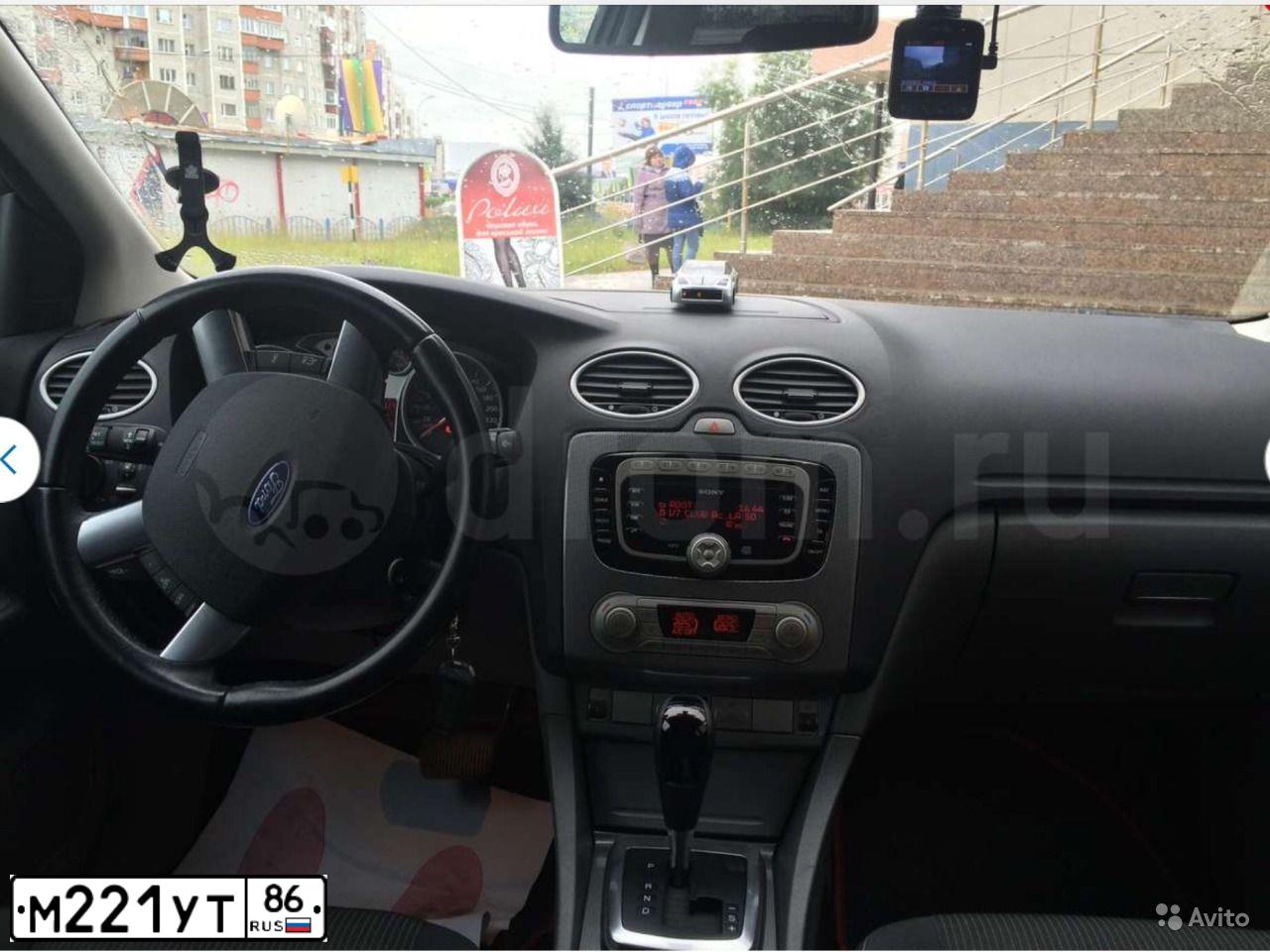 Фото автомобиля FORD FOCUS, 2011 — госномер М221УТ86. Цвет: СЕРЕБРИСТЫЙ