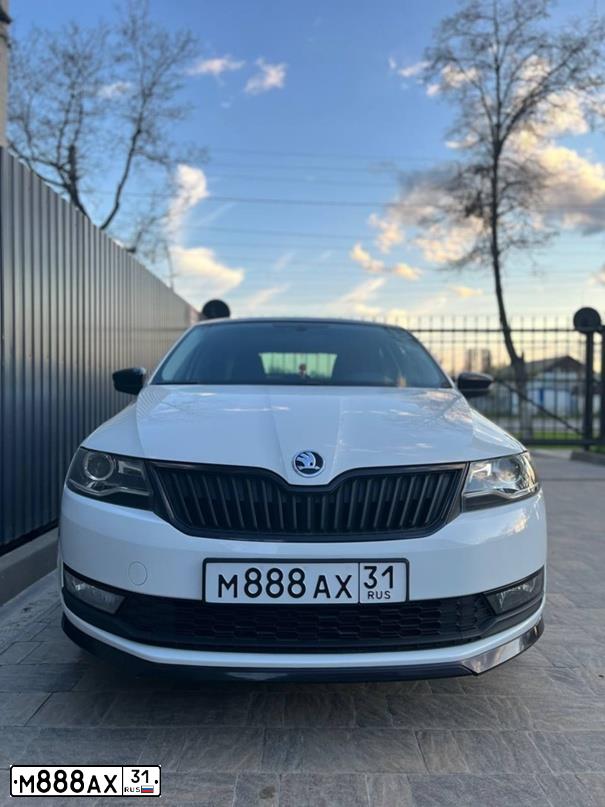 Фото автомобиля SKODA RAPID, 2017 — госномер Х644АУ31. Цвет: Белый