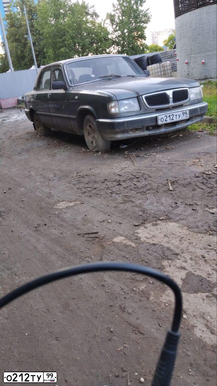 Фото автомобиля GAZ 3110 WOLGA, 2001 — госномер О212ТУ99. Цвет: СЕРЫЙ МЕТАЛЛИК