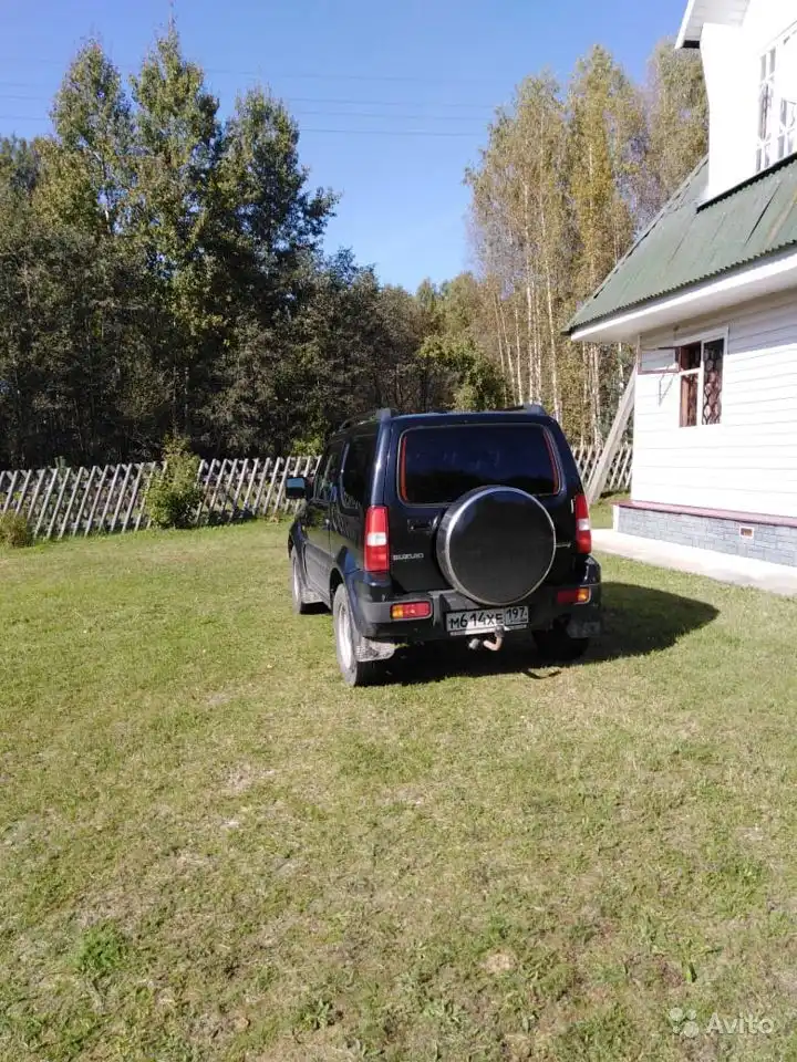 Фото автомобиля SUZUKI JIMNY, 2012 — госномер М614ХЕ197. Цвет: ЧЕРНЫЙ
