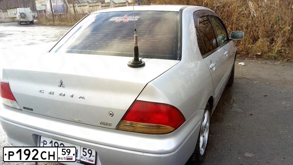 Фото автомобиля MITSUBISHI LANCER, 2002 — госномер У650СУ124