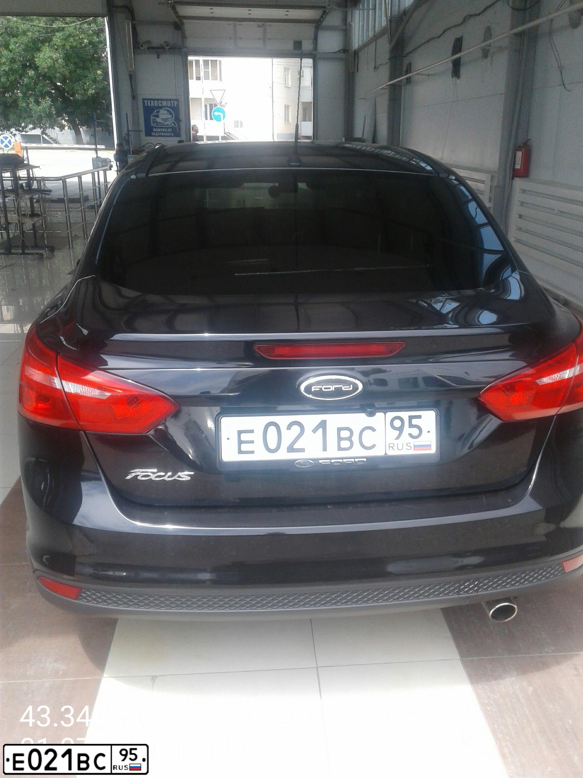 Фото автомобиля FORD FOCUS, 2012 — госномер Е021ВС95. Цвет: ЧЕРНЫЙ