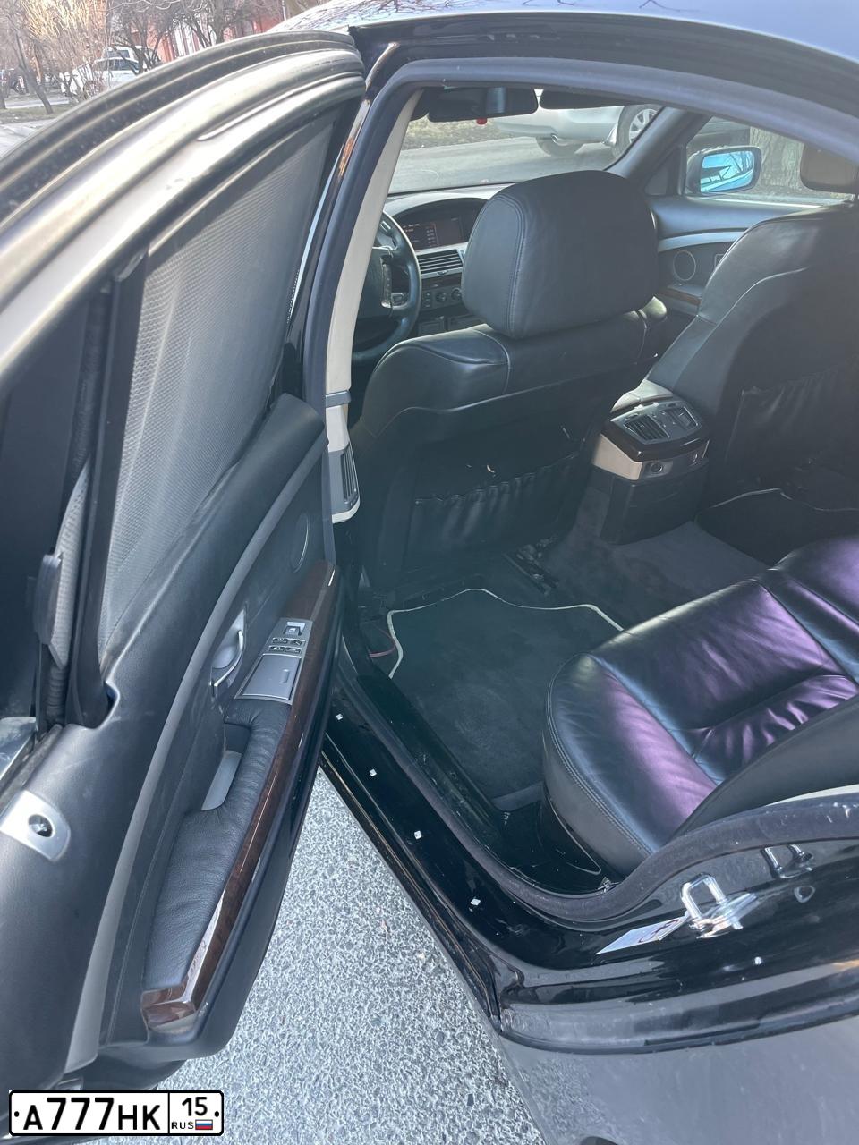 Фото автомобиля BMW 745I, 2003 — госномер Н767ТМ15. Цвет: ЧЕРНЫЙ