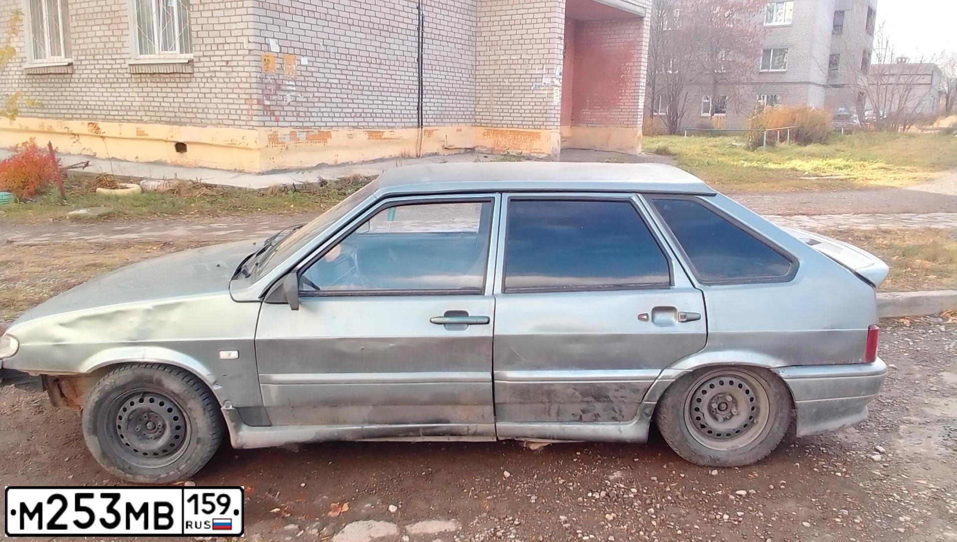 Фото автомобиля LADA 2114 SAMARA, 2004 — госномер М253МВ159. Цвет: средний серо-зеленый металлик