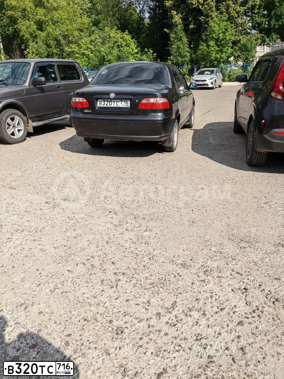 Фото автомобиля FIAT ALBEA, 2010 — госномер В320ТС716. Цвет: ЧЕРНЫЙ