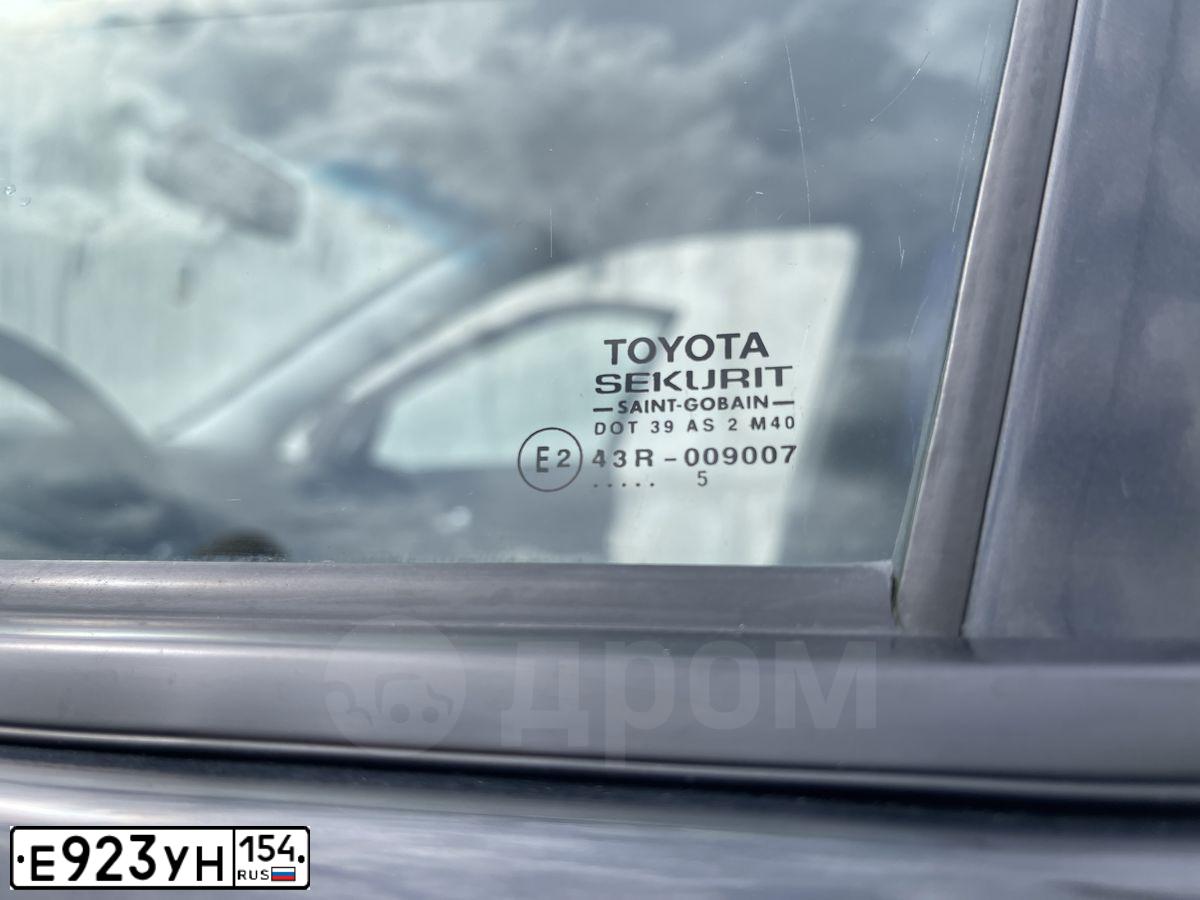 Фото автомобиля TOYOTA COROLLA, 2005 — госномер Е923УН154. Цвет: ЧЕРНЫЙ