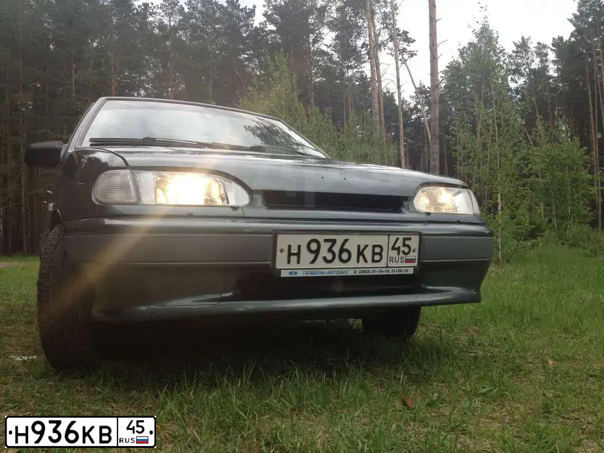 Фото автомобиля LADA 2114 SAMARA, 2007 — госномер Н299КУ45. Цвет: СЕРО-СИНЕ-ЗЕЛЕНЫЙ