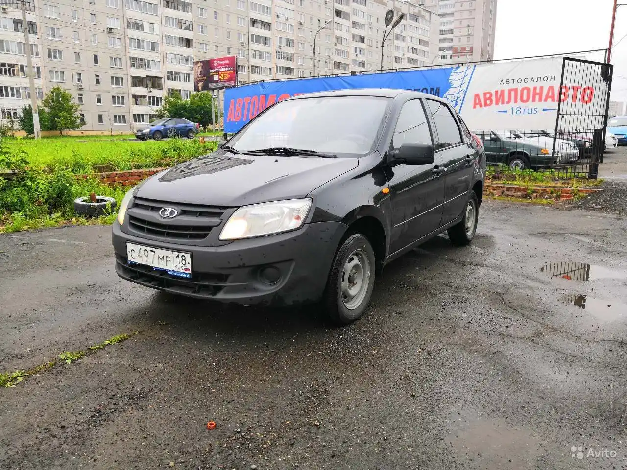 Фото автомобиля LADA GRANTA, 2013 — госномер Х164УР31. Цвет: ЧЕРНЫЙ