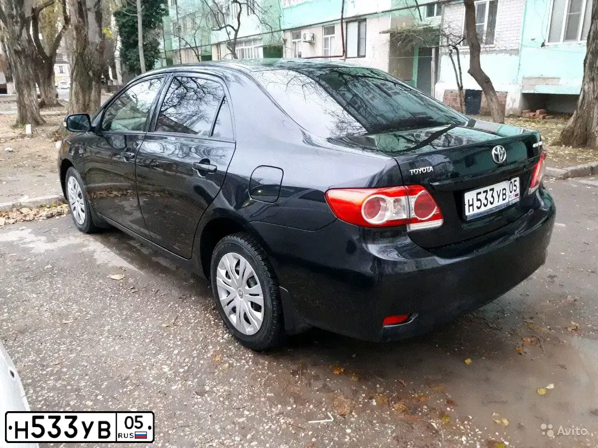 Фото автомобиля TOYOTA COROLLA, 2012 — госномер Н533УВ05. Цвет: ЧЕРНЫЙ