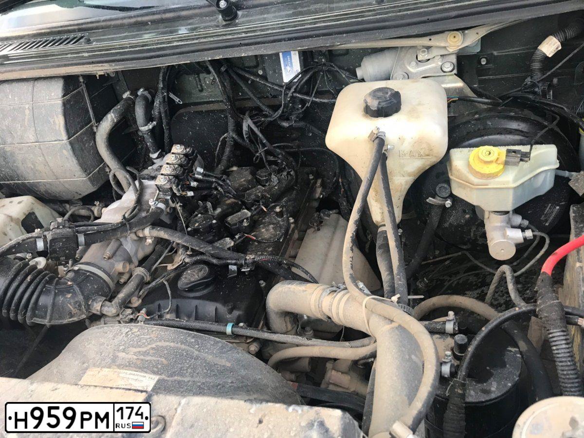 Фото автомобиля UAZ 2363 PICKUP, 2012 — госномер Н959РМ174. Цвет: ЗЕЛЕНЫЙ