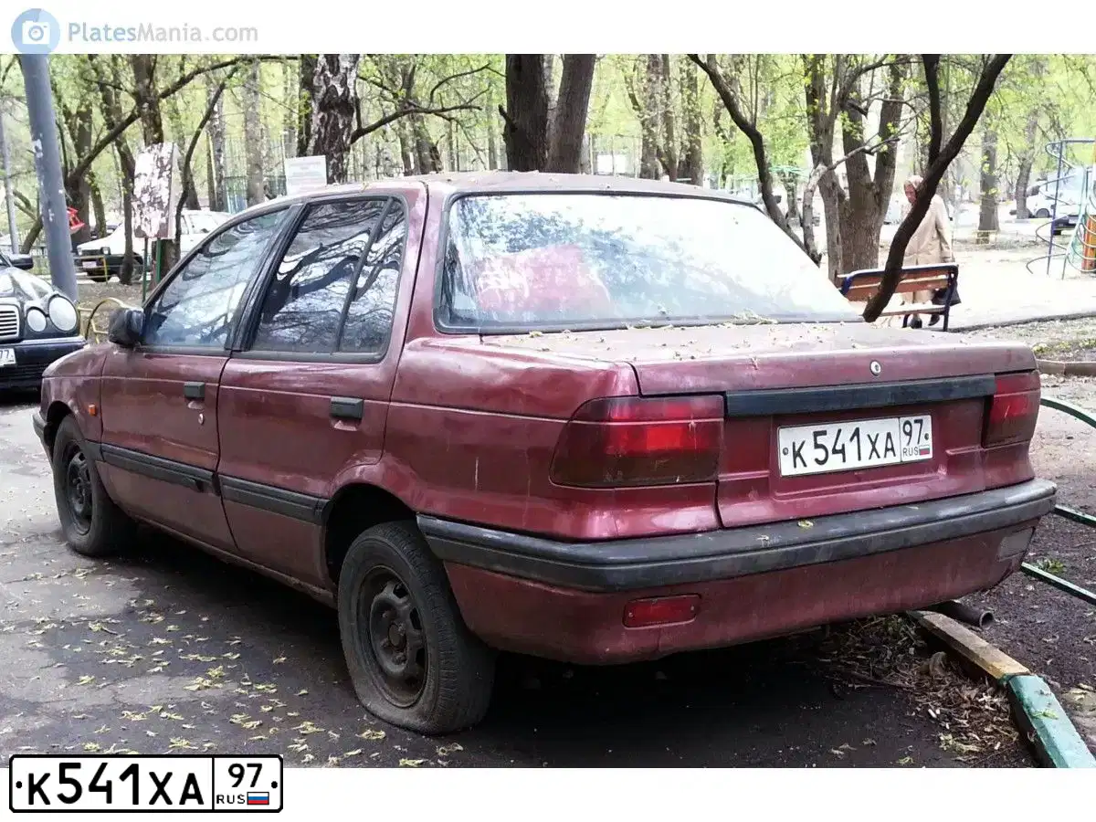 Фото автомобиля MITSUBISHI LANCER, 1990 — госномер К541ХА97. Цвет: КРАСНЫЙ